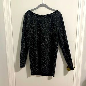 Medium, scoop neck with zipper in the back.